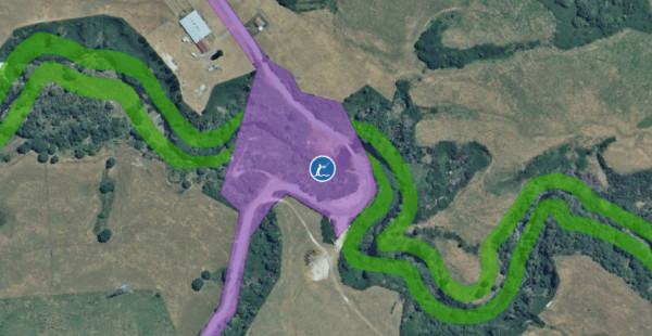 A satellite view of a river with access highlighted and an angling icon